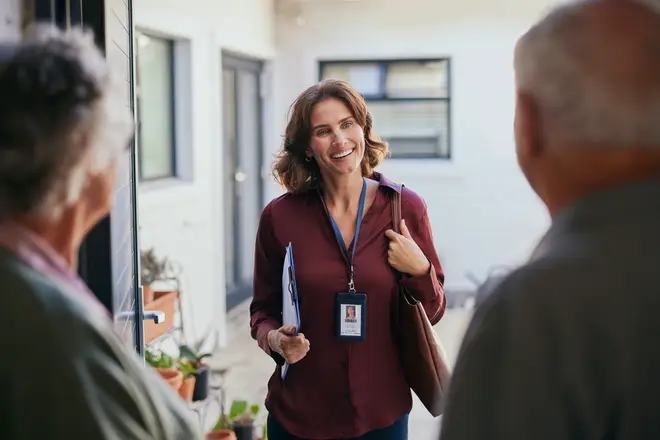 Professional woman approaching clients